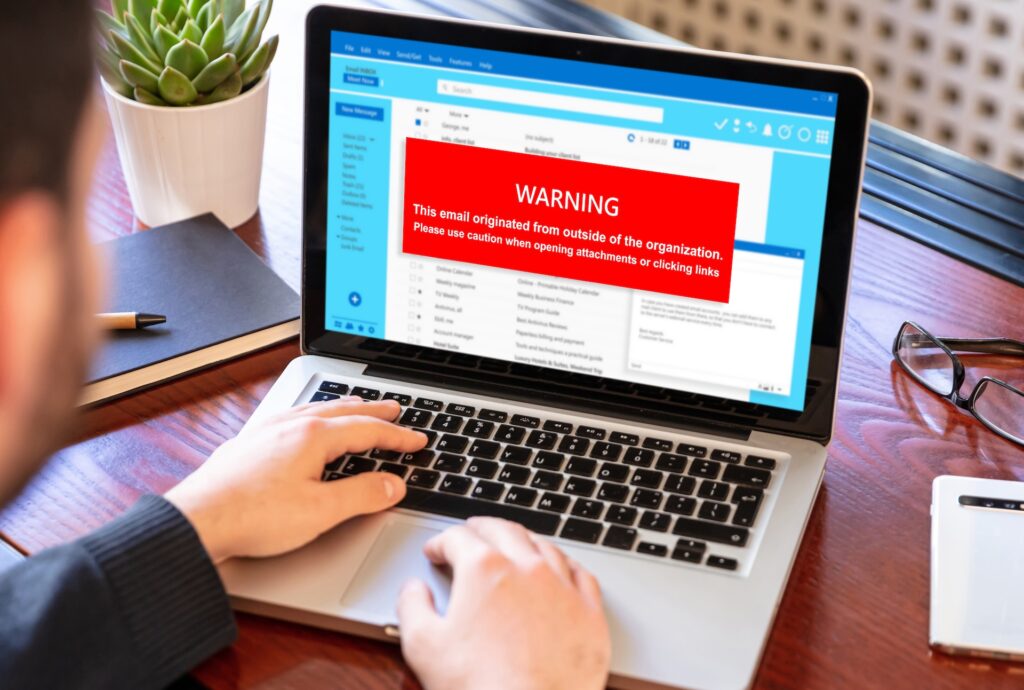 email attachments warning message on a laptop scre 2024 12 07 16 16 57 utc